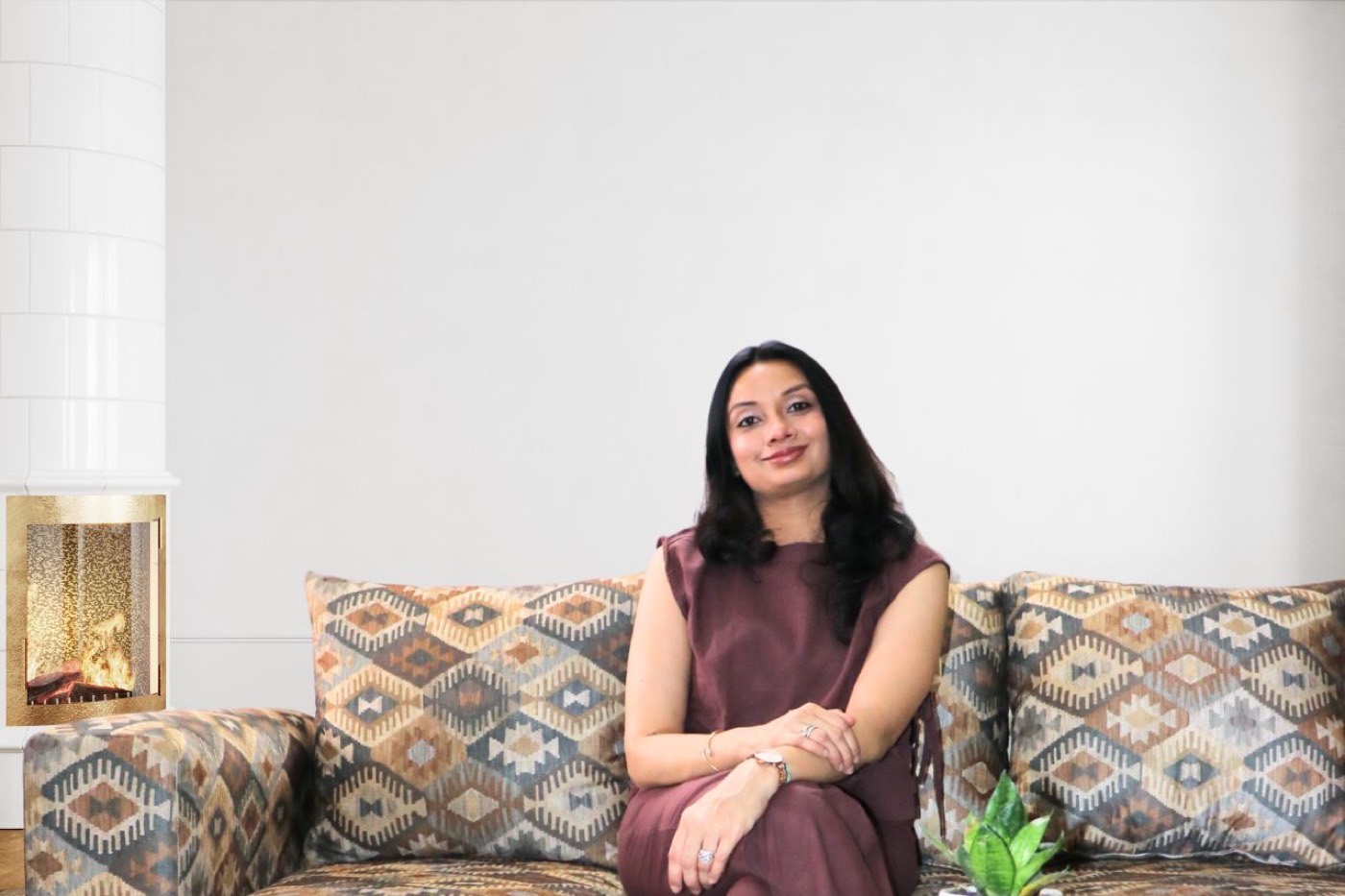 Sneha Maheshwri, trauma-informed therapist, trainer and coach, seated during an online therapy session
